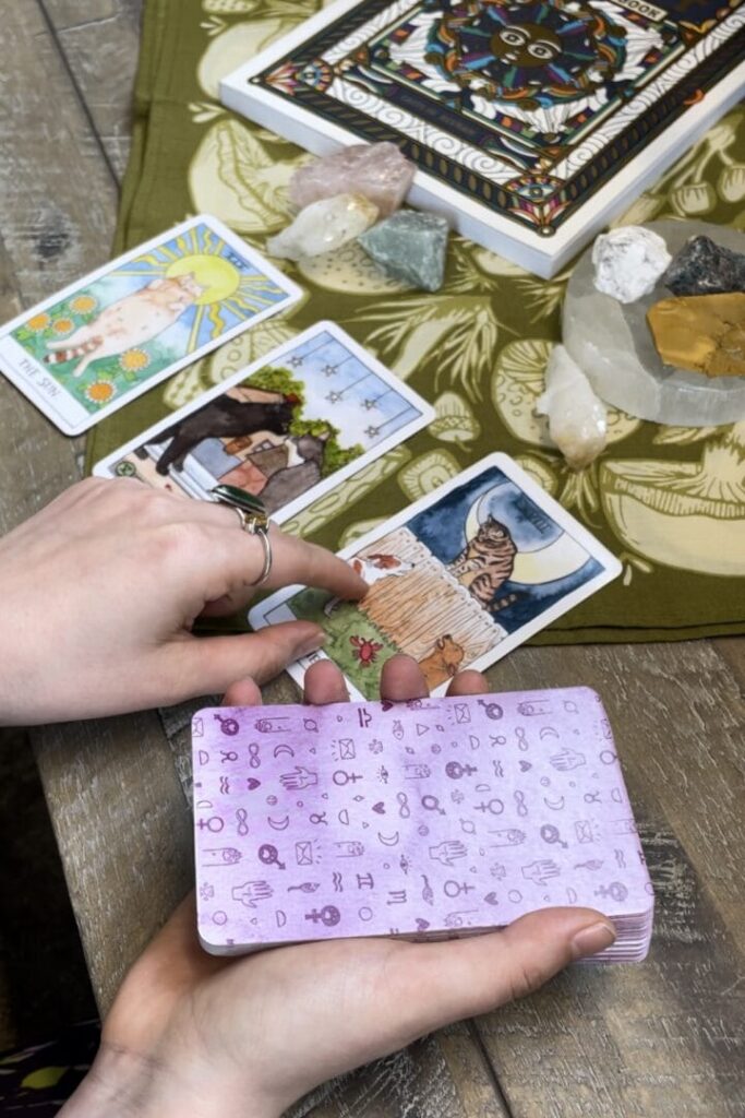 tarot cards being dealt