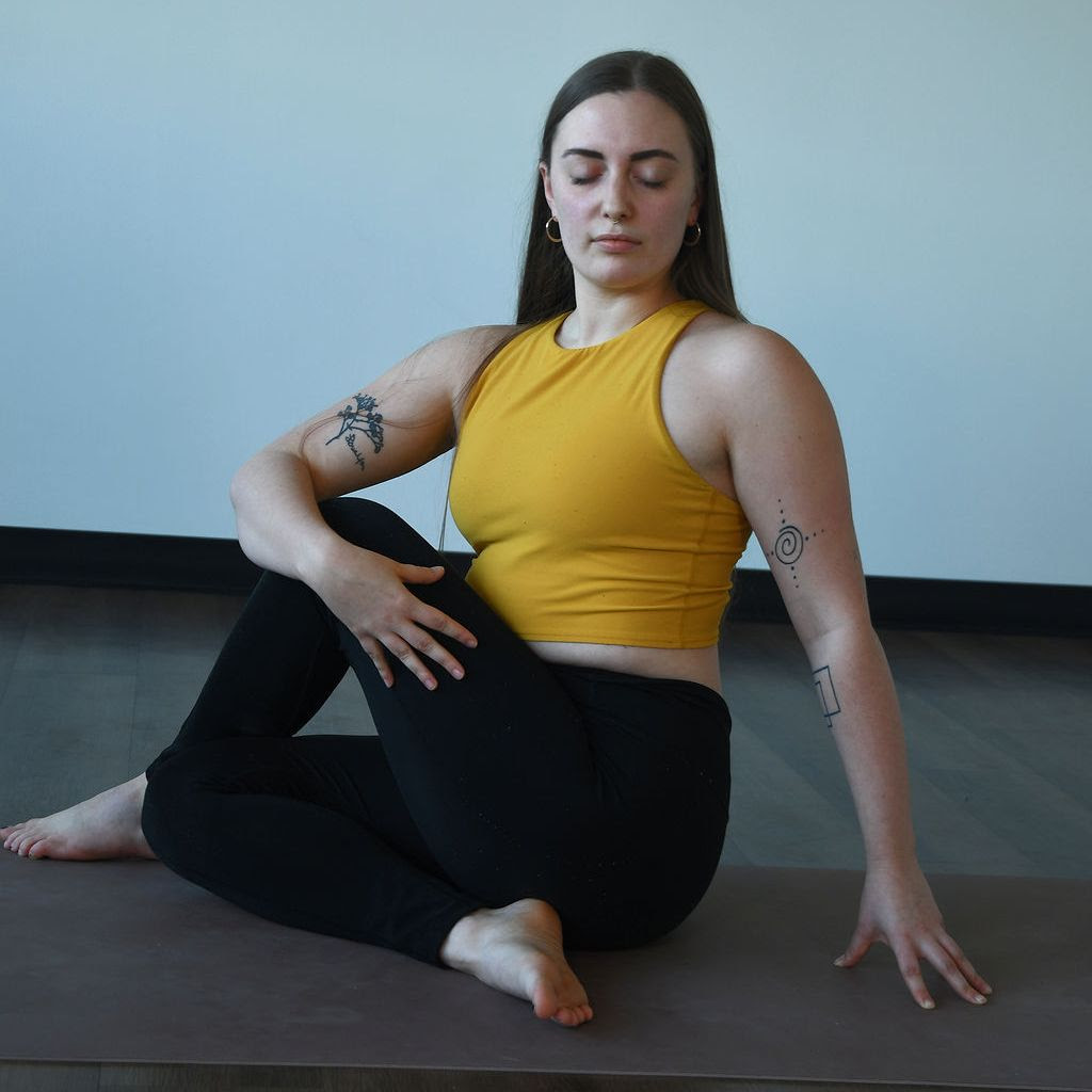 Zoe doing Ardha Matsyendrasana