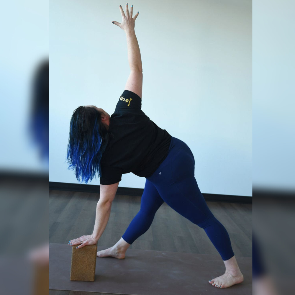 Kati Black in trikonasana pose