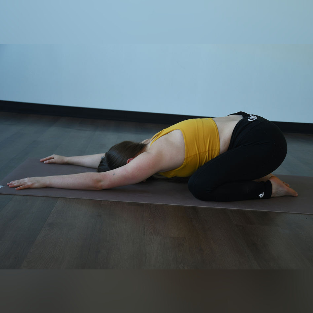 Zoe Lowden practices balasana