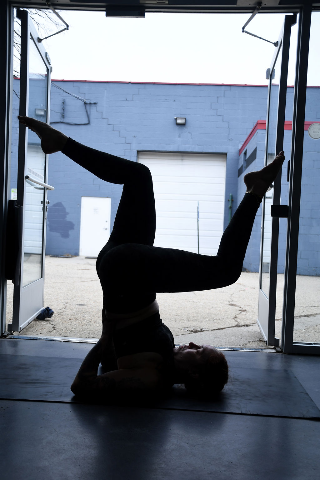 Marta Gruber practices shoulder stand