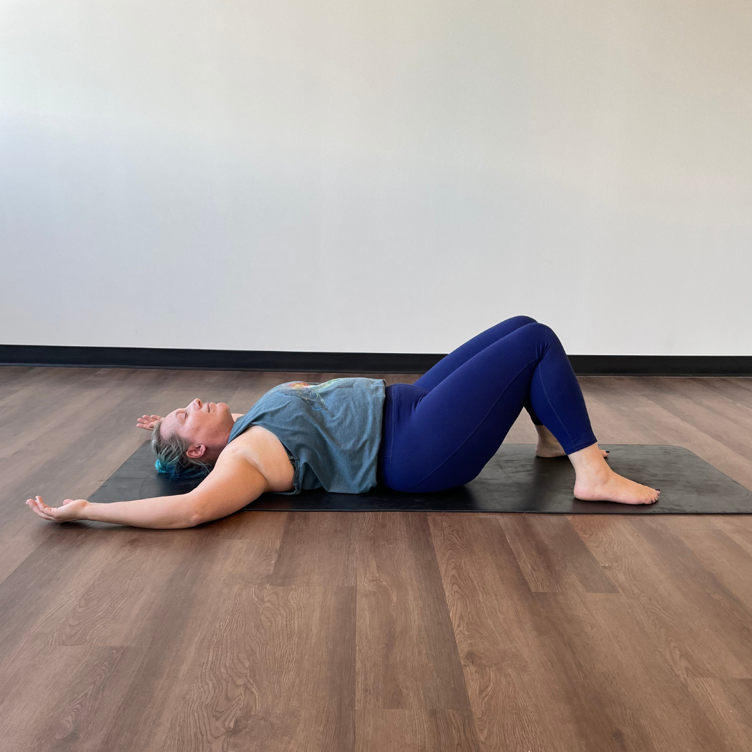 Kati Black practices reclined cactus pose