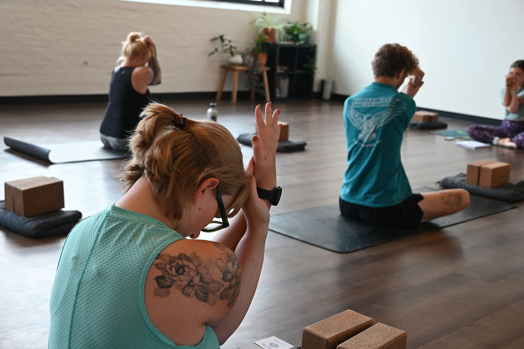 Students participate in The Honoring Yoga Class