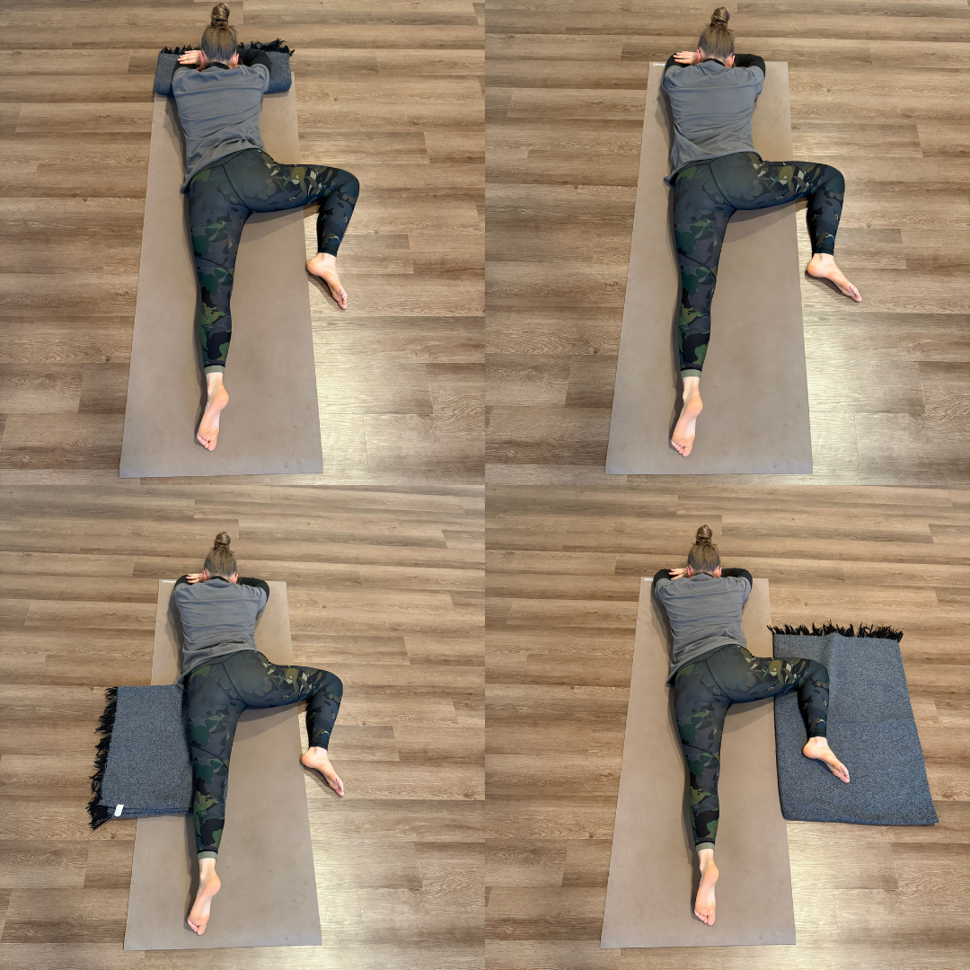 Zoe Lowden, a white woman with brunette hair, pulled into a bun, practices half frog pose on a tan yoga mat, while wearing camo colored leggies, and a grey shirt over a darker shirt. She shows four different variations using a blanket as a propr underneath the arms, the knee, and the hip.